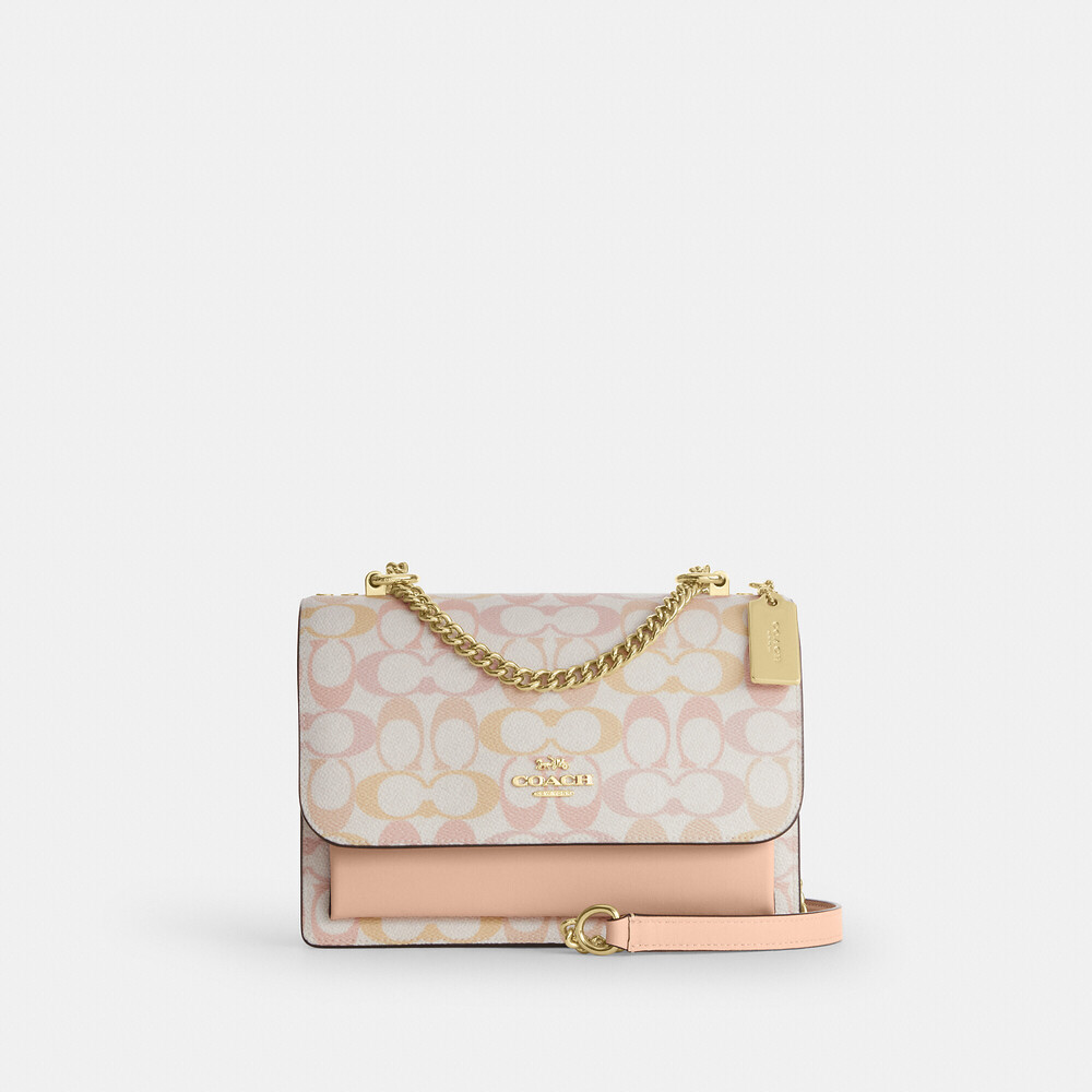Coach Klare Crossbody Bag In Signature Canvas pink